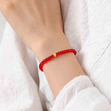 Load image into Gallery viewer, Red Austrian Crystal Fortune Bracelet with Plated Gold Cat-Eye Bead
