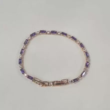 Load and play video in Gallery viewer, Elegant Purple Crystal Rose Gold Tennis Bracelet – Dainty Baguette Cut Zirconia Chain
